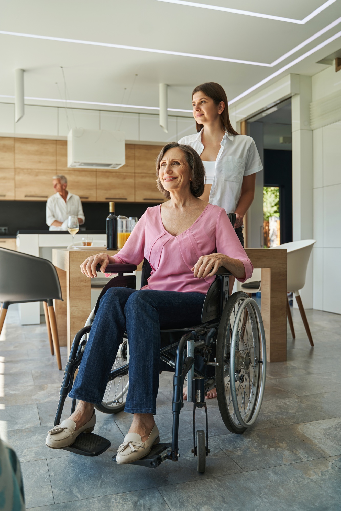 People supporting and helping female person at home